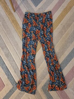 Free People Navy Blue Floral Boot-Cut Pants with Bright Orange Blooms